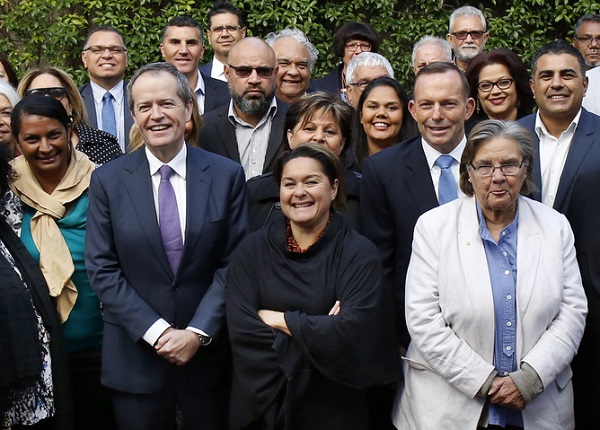 Australian Prime Minister Tony Abbott and Australian Opposition Leader Bill Shorten pose for a photograph with indigenous leaders  before a meeting to consider the model for a referendum on indigenous recognition in Kirribilli, Sydney. Monday, July 6, 2015 (AAP Image/David Moir) NO ARCHIVING